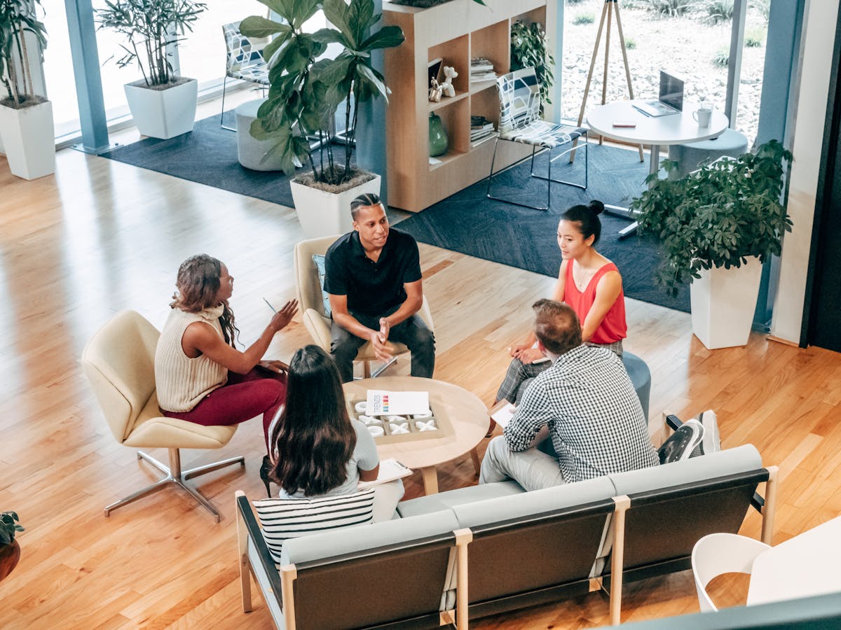 Diverse team of professionals collaborating on financial documents